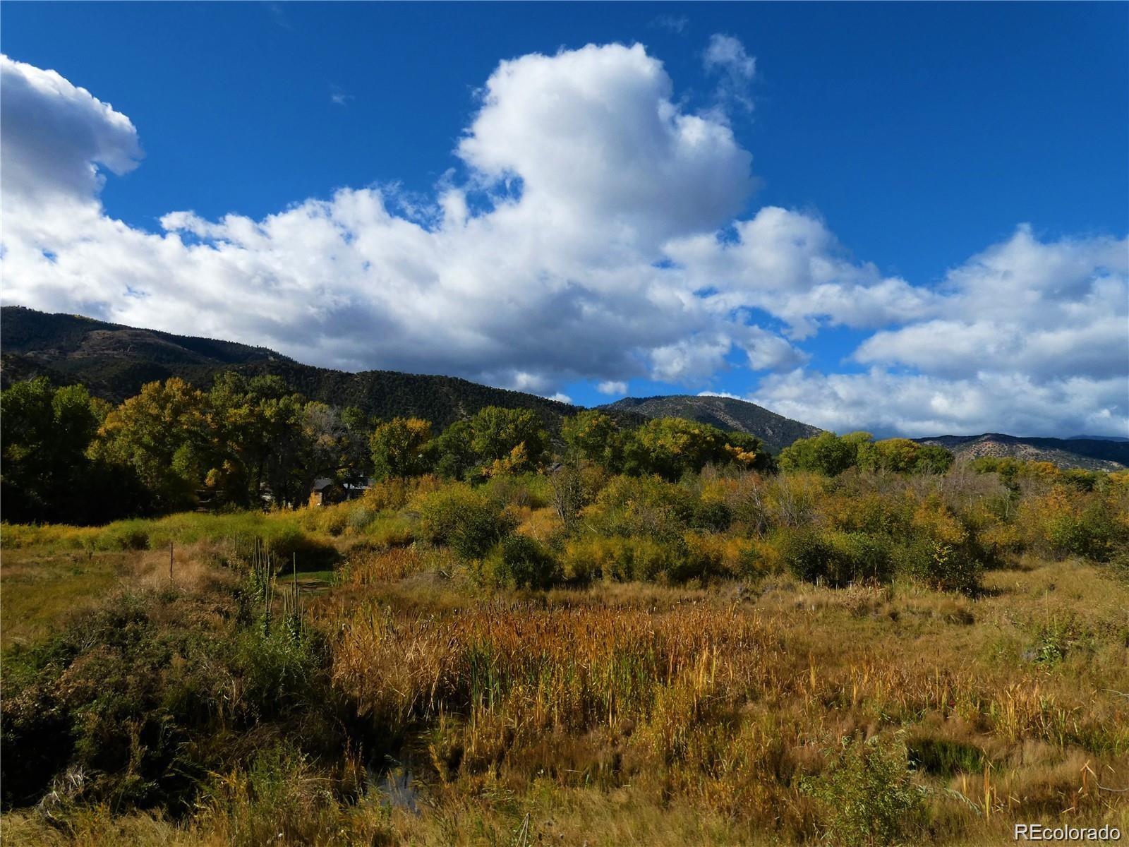 Beautiful 3/4 + acre home site in areas finest riverfront community!