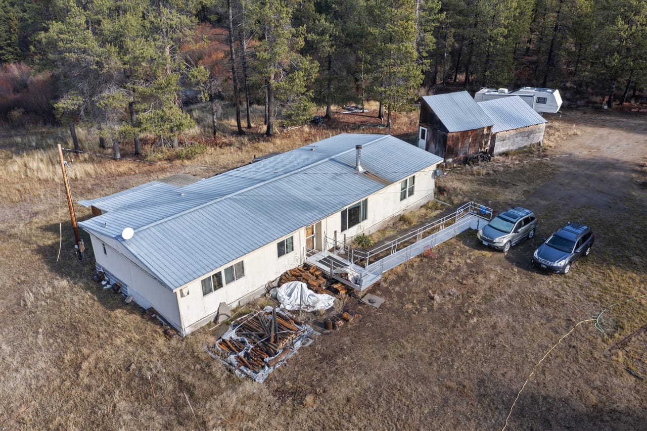 141580 N Hwy 97 - Tranquil Riverfront Home for Sale