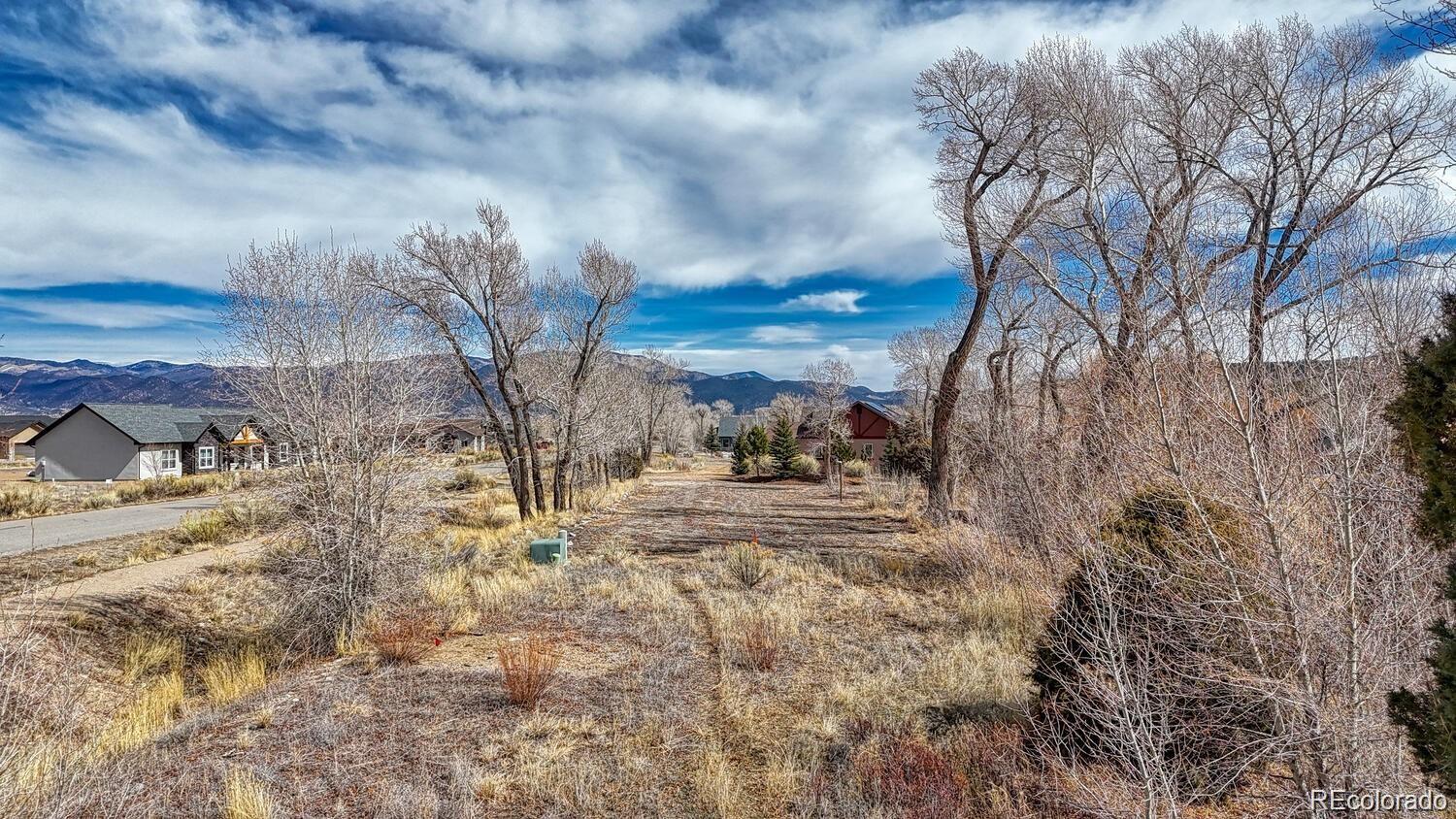 Beautiful 3/4 + acre home site in areas finest riverfront community!