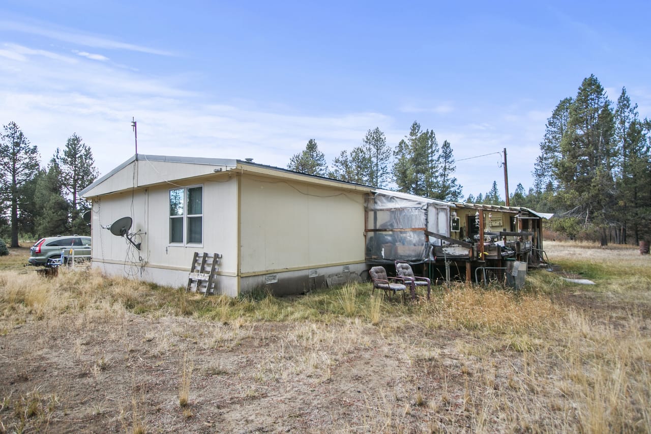 141580 N Hwy 97 - Tranquil Riverfront Home for Sale