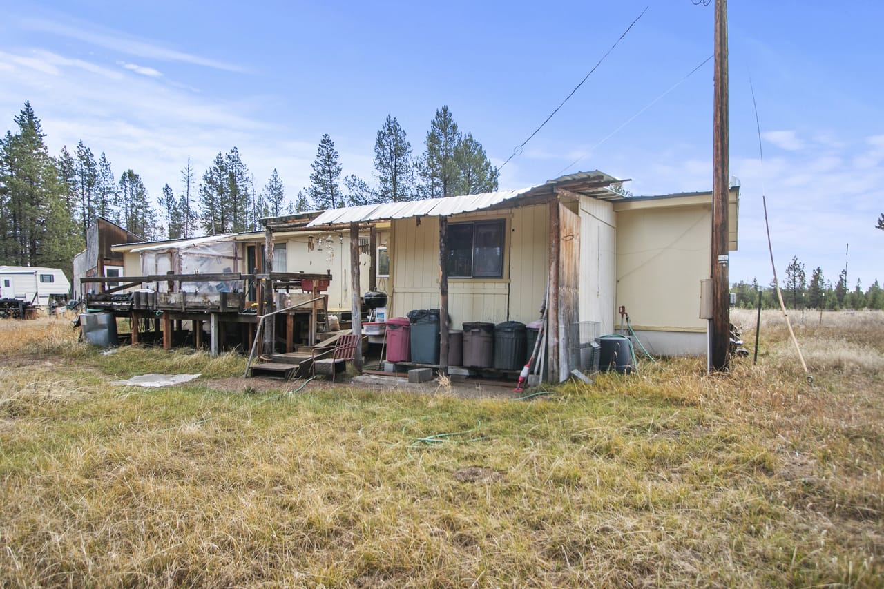 141580 N Hwy 97 - Tranquil Riverfront Home for Sale